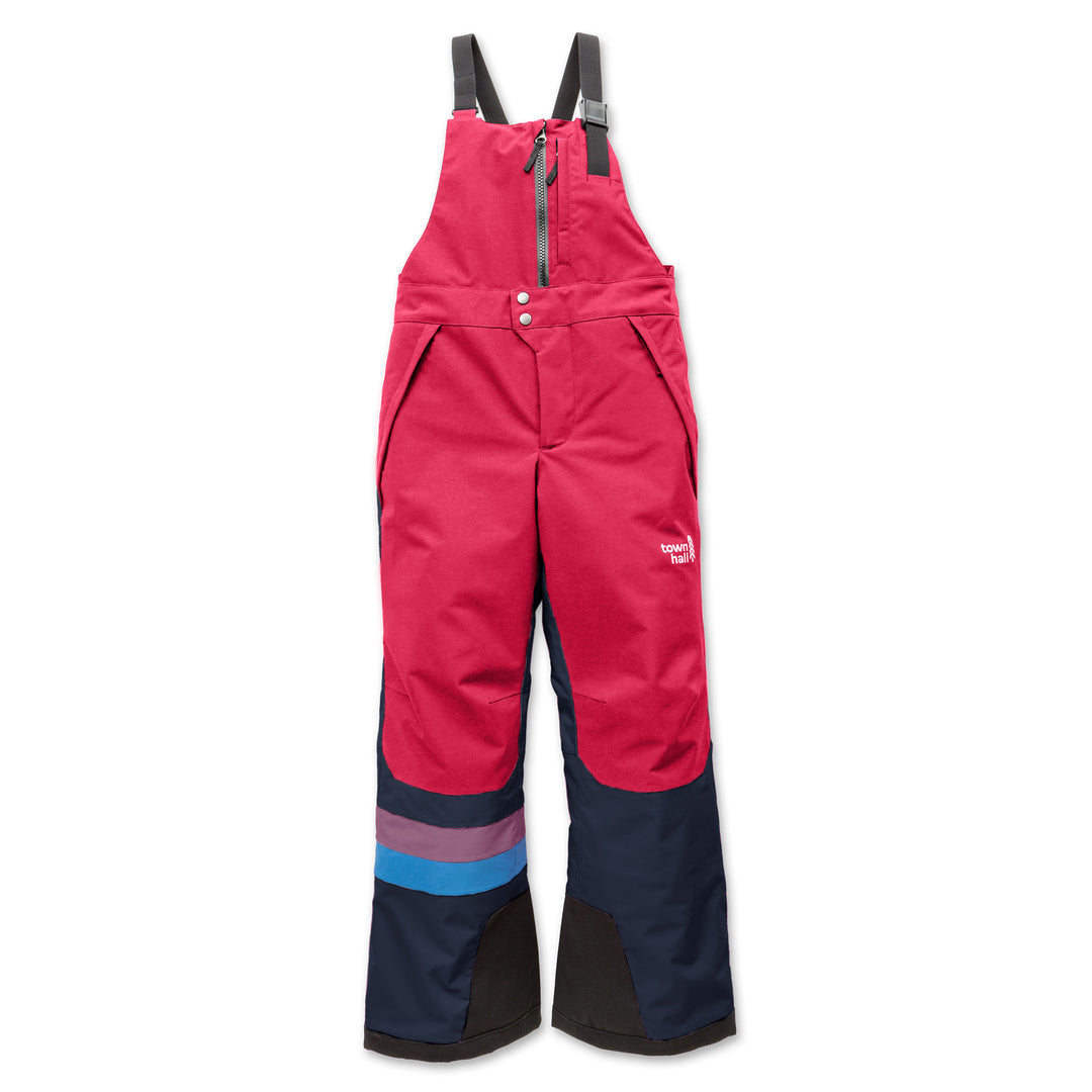 Red and navy snow pants with suspenders on a white background